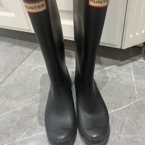 Black knee high hunter boots. Size 36